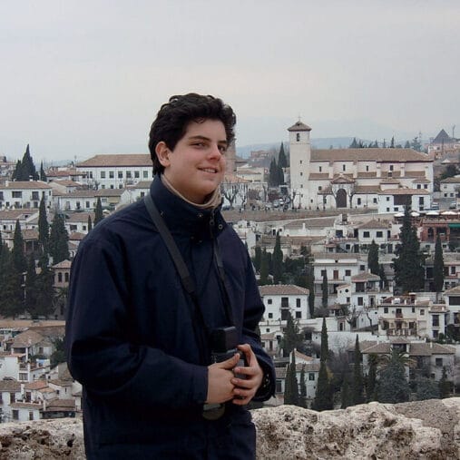 blessed carlo city behind him